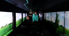 An autonomous 5G-connected bus, operated by the Korean telecom KT Corp., travels during a 2018 media event in Gangneung, Gangwon Province, South Korea. Instead of windows, the self-driving shuttle bus has interior video screens that display live coverage of events in 5G and uses 5G to navigate the roads.