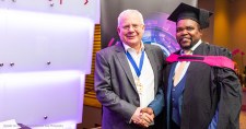 CIMA president Steven Swientozielskyj with a Diploma in Management Accounting graduate in Gauteng, South Africa.