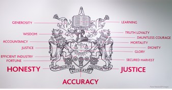 The Institute’s coat of arms, shown here annotated on a wall in the CIMA office in London, has evolved over the years to incorporate symbols that represent the work of its members.