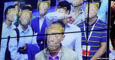 Visitors experience facial-recognition technology at the Face++ booth at the China Public Security Expo in Shenzhen, China, in October 2017.
