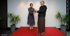 Ginny Lim (left), the Association of International Certified Professional Accountants’ head of Southeast Asia, presents a token of appreciation to professor U Maw Than, Ph.D., union auditor general, at the CIMA centenary celebration in Yangon, Myanmar.