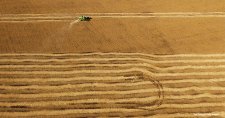 A combine harvests soya beans in a village in Russia’s Far East region that borders China’s northeastern Heilongjiang province.