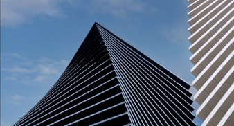 Abstract image of contrasting buildings.